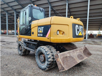 Колёсный экскаватор CATERPILLAR M315D