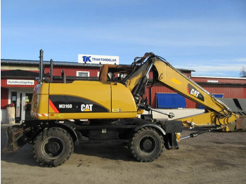 Колёсный экскаватор CATERPILLAR M316D