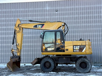 Колёсный экскаватор CATERPILLAR M315D