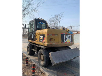 Колёсный экскаватор CATERPILLAR 315D