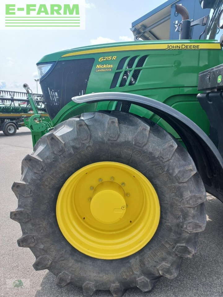 Трактор John Deere 6215r: фото 7